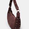 100% leeren schoudertas met studs