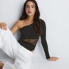 Asymmetrische bodysuit met doorschijnende details Asymmetrische bodysuit met doorschijnende details