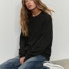 Asymmetrische gebreide trui Asymmetrische gebreide trui