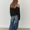 Asymmetrische gebreide trui Asymmetrische gebreide trui