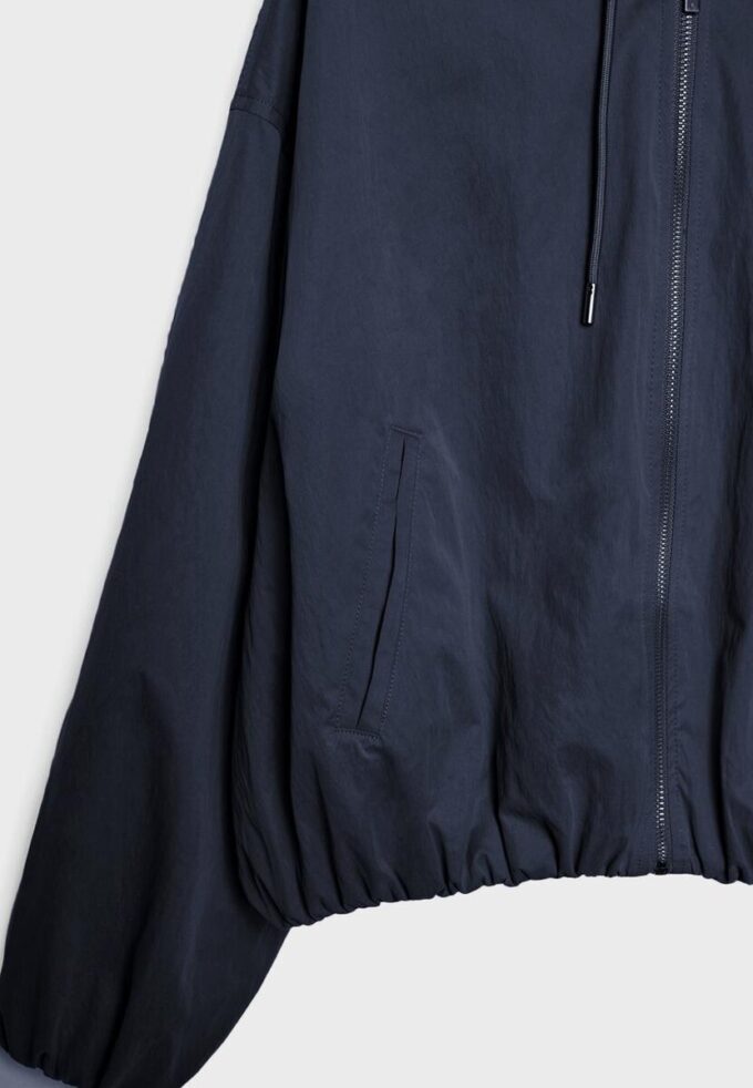Basics nylon jas met capuchon