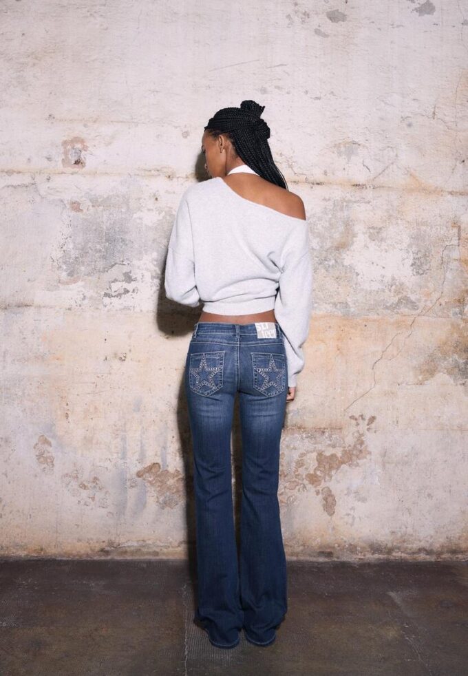 Geborduurde bell-bottom jeans met zak Geborduurde bell-bottom jeans met zak