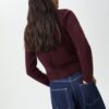 Gebreid jasje met knoopsluiting