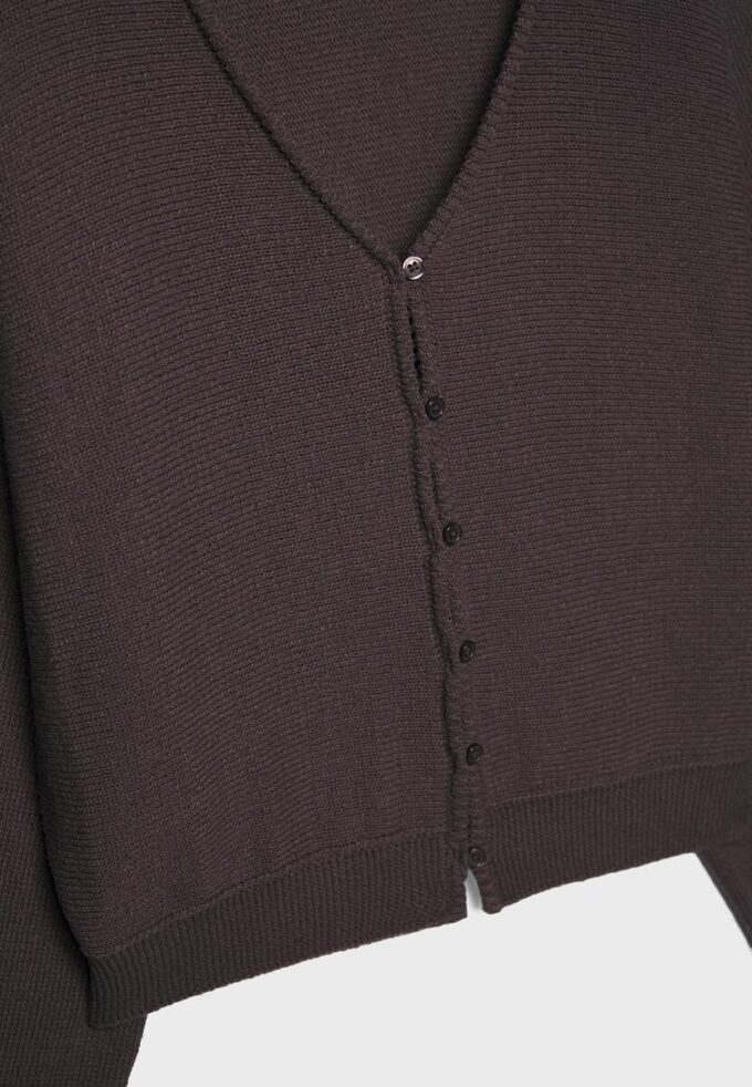 Gebreid vest met vleermuismouwen