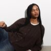 Geknoopt vest met kabelpatroon Geknoopt vest met kabelpatroon