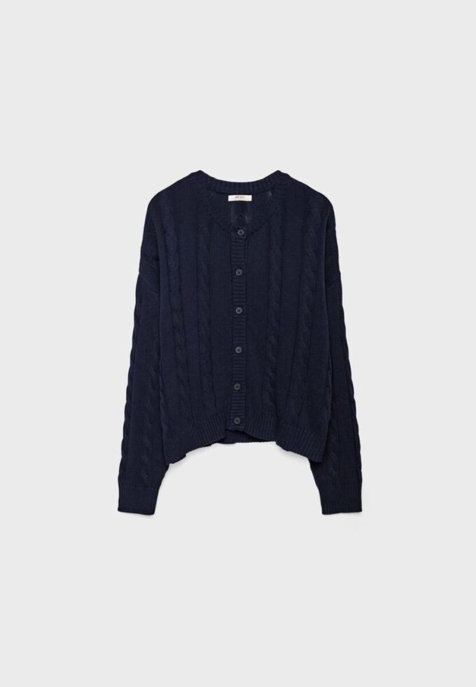 Geknoopt vest met kabelpatroon Geknoopt vest met kabelpatroon