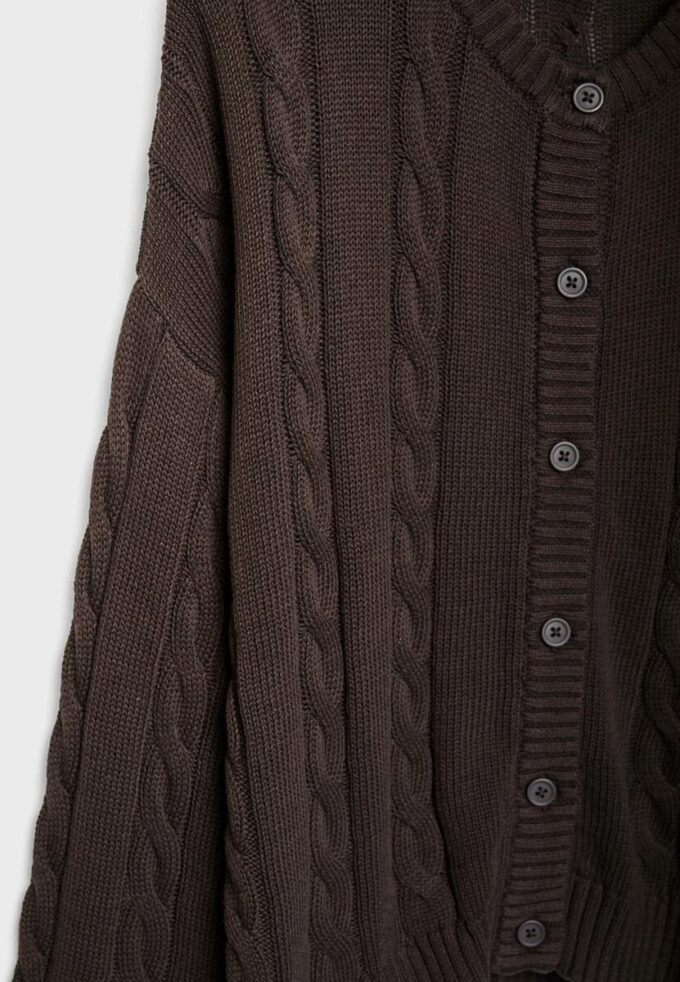Geknoopt vest met kabelpatroon Geknoopt vest met kabelpatroon