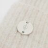 Geribde beanie met plaquette