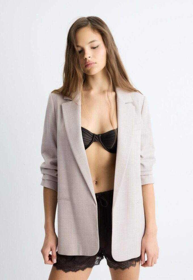 Gestreepte open blazer Gestreepte open blazer