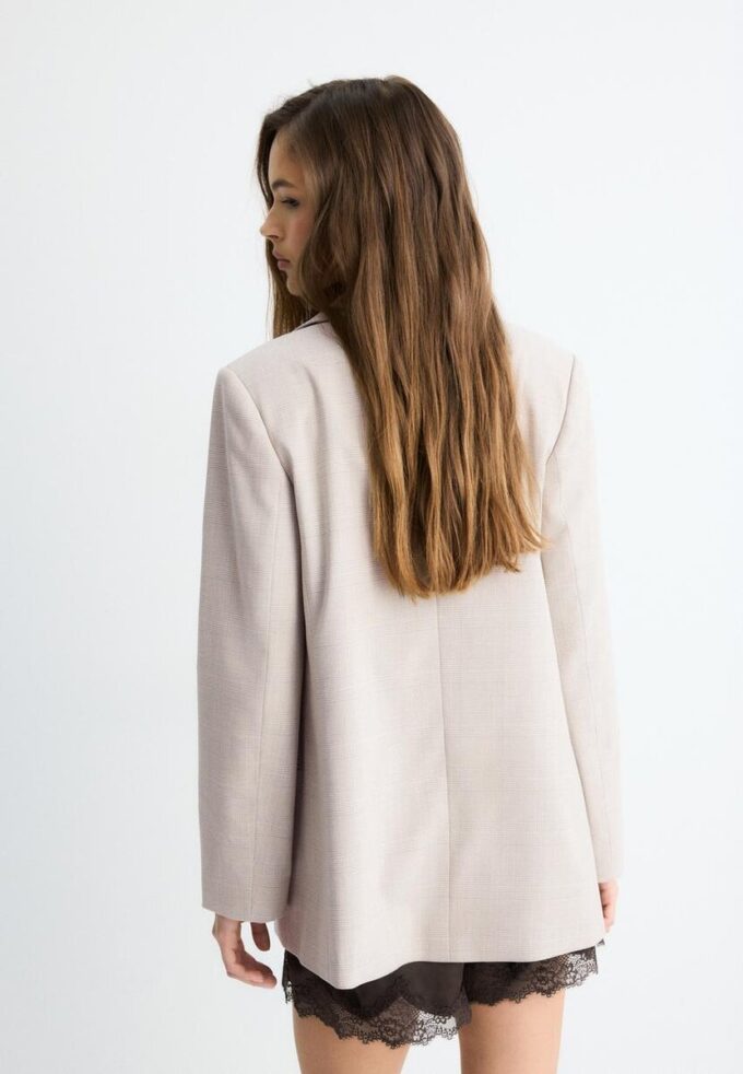 Gestreepte open blazer Gestreepte open blazer