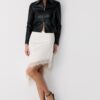 Getailleerd jasje met leerlook Getailleerd jasje met leerlook