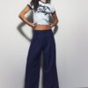 Getailleerde broek met Wide Leg pijpen en coupenaden Getailleerde broek met Wide Leg pijpen en coupenaden