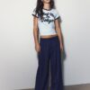 Getailleerde broek met Wide Leg pijpen en coupenaden Getailleerde broek met Wide Leg pijpen en coupenaden