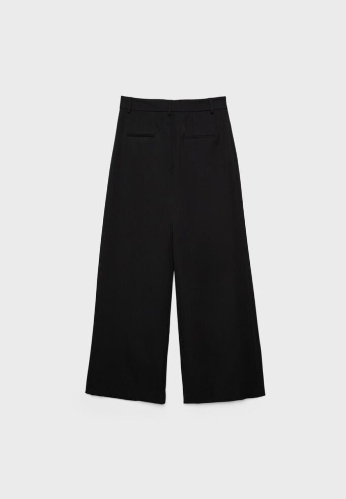 Getailleerde broek met Wide Leg pijpen en coupenaden Getailleerde broek met Wide Leg pijpen en coupenaden
