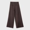 Getailleerde broek met Wide Leg pijpen en coupenaden Getailleerde broek met Wide Leg pijpen en coupenaden