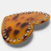 Hartvormige clip met studs