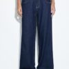 Jeans met lage taille en dubbele knoopsluiting Jeans met lage taille en dubbele knoopsluiting