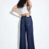 Jeans met lage taille en dubbele knoopsluiting Jeans met lage taille en dubbele knoopsluiting