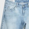 Jeans met lage taille en rechte pijpen Jeans met lage taille en rechte pijpen