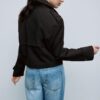 Korte trenchcoat met dubbele knoopsluiting Korte trenchcoat met dubbele knoopsluiting
