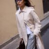 Lange trenchcoat met enkele rij knopen
