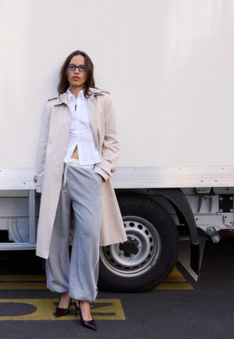 Lange trenchcoat met enkele rij knopen