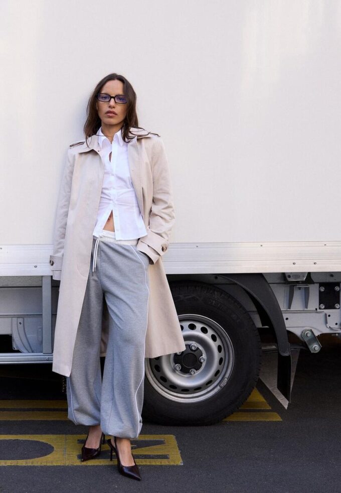 Lange trenchcoat met enkele rij knopen