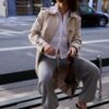 Lange trenchcoat met enkele rij knopen