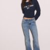 Low-rise jeans met uitlopende pijpen Low-rise jeans met uitlopende pijpen