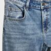 Low-rise jeans met uitlopende pijpen Low-rise jeans met uitlopende pijpen