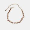 Metalen riem met leerlook