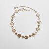 Metalen riem met ronde plaatjes