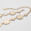Metalen riem met ronde plaatjes