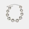 Metalen riem met ronde plaatjes