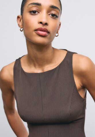 Mouwloze peplumtop