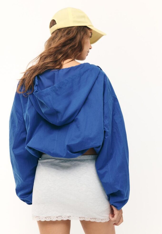 Nylon jas met capuchon Nylon jas met capuchon