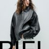 Oversize 100% leerjas met klep