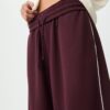 Pluche broek met Wide Leg pijpen en sierstuk Pluche broek met Wide Leg pijpen en sierstuk
