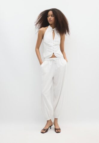 Qipao-top met halternek en knopen