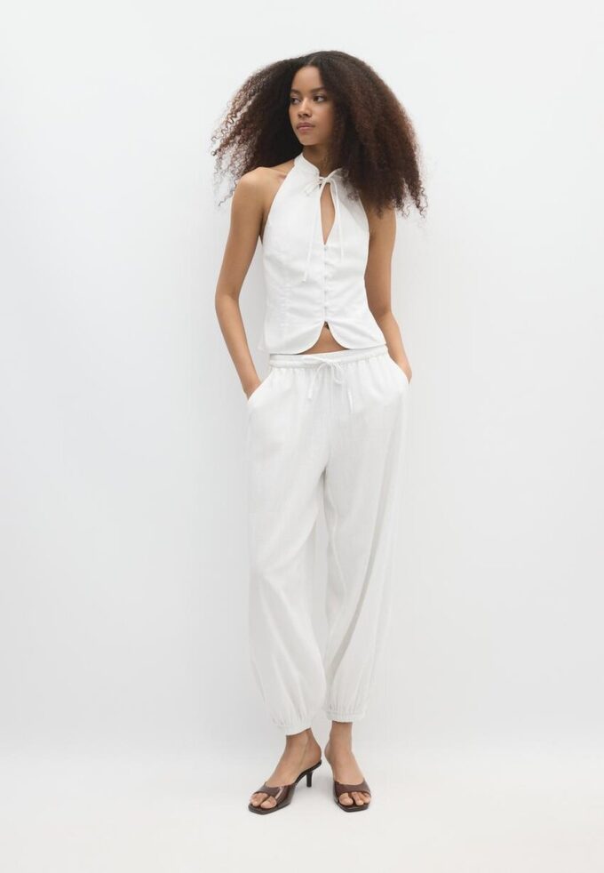 Qipao-top met halternek en knopen
