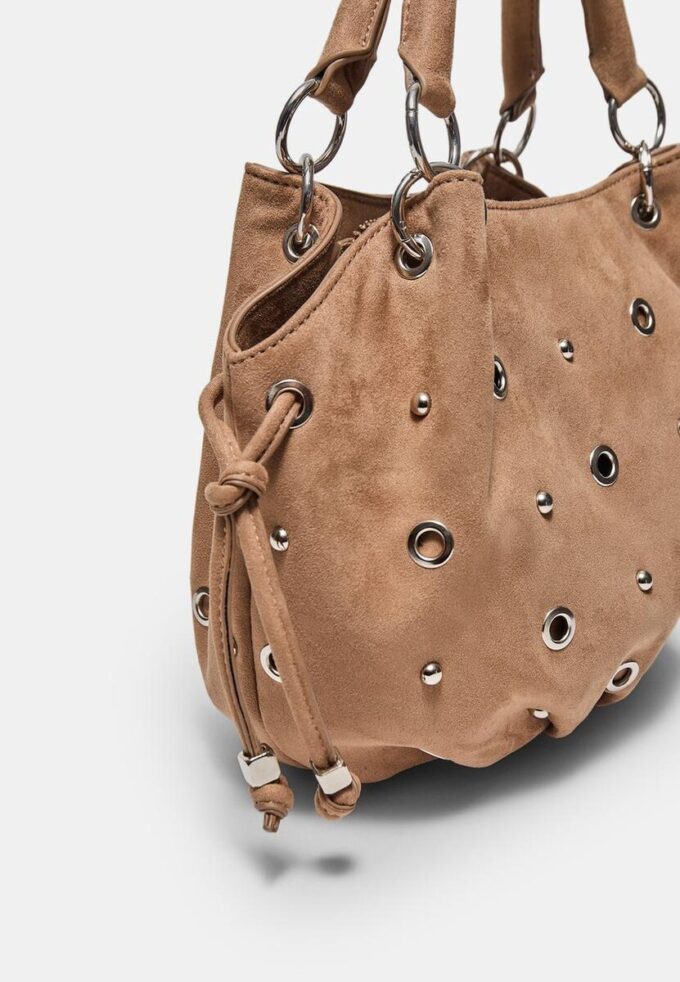 Ronde crossbodytas met oogjesdetail