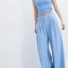 Rustieke broek met Wide Leg pijpen en verstelbare knopen Rustieke broek met Wide Leg pijpen en verstelbare knopen