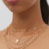 Set van 5 roze steenbedelkettingen