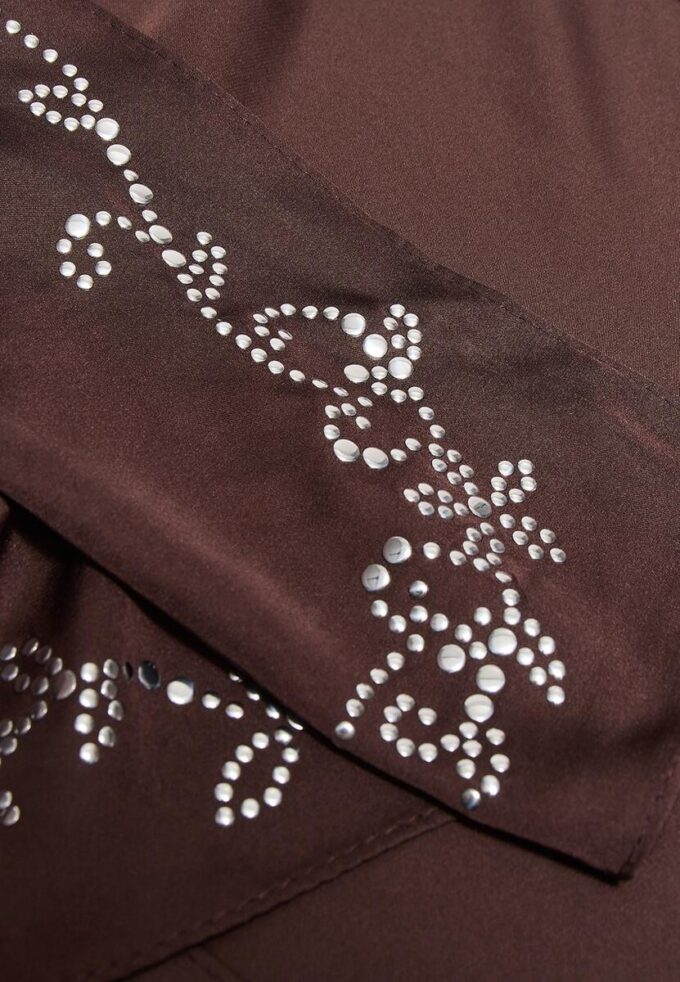 Sjaal met bitdetail
