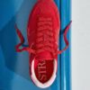 Sneakers met platte zool en details van leer
