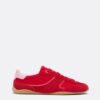 Sneakers met platte zool en details van leer
