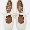 Sneakers met strik en platte zool