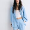 Soepelvallende blazer met dubbele rij knopen