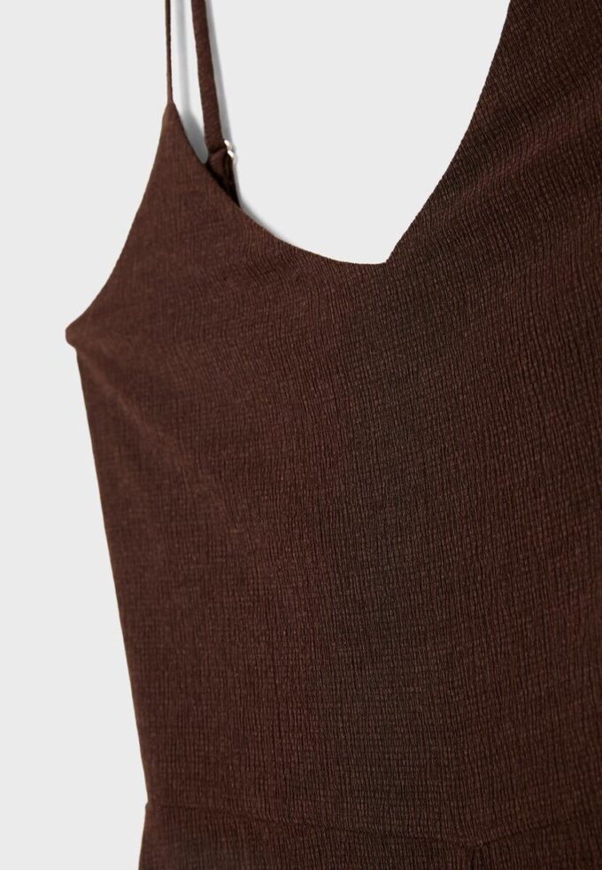 Soepelvallende jumpsuit met bandjes Soepelvallende jumpsuit met bandjes