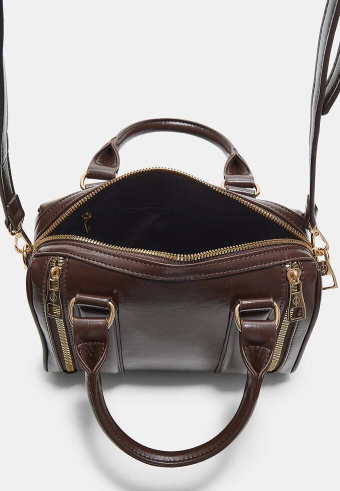 Tas met ritsen in leerlook